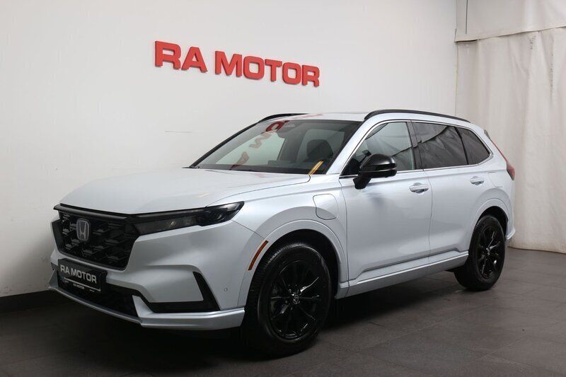 Silver (vit metallic) Begagnad 2023 Honda CR-V Hybrid SUV | 559 900 kr (Dyr) - Bild 1/4
