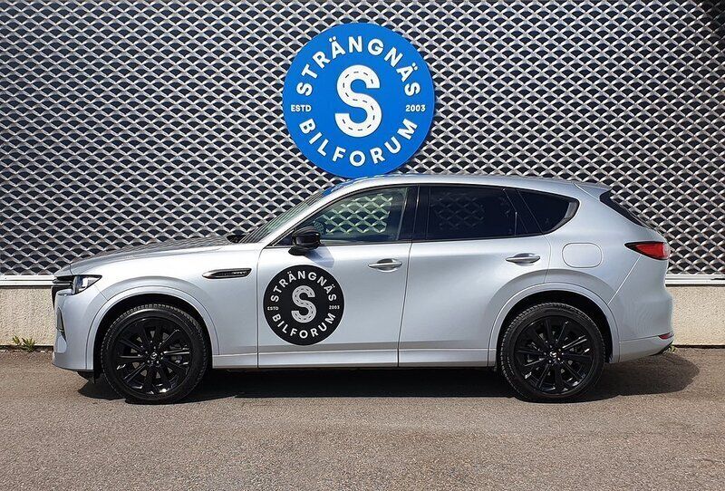 Grå Begagnad 2024 Mazda CX-60 Homura-Line SUV | 554 000 kr (Marknadspris) - Bild 1/4