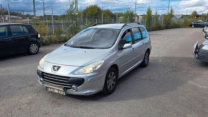 Ljusgrå (grå) Begagnad 2006 Peugeot 307 Kombi | 15 900 kr (Marknadspris) - Bild 1/4