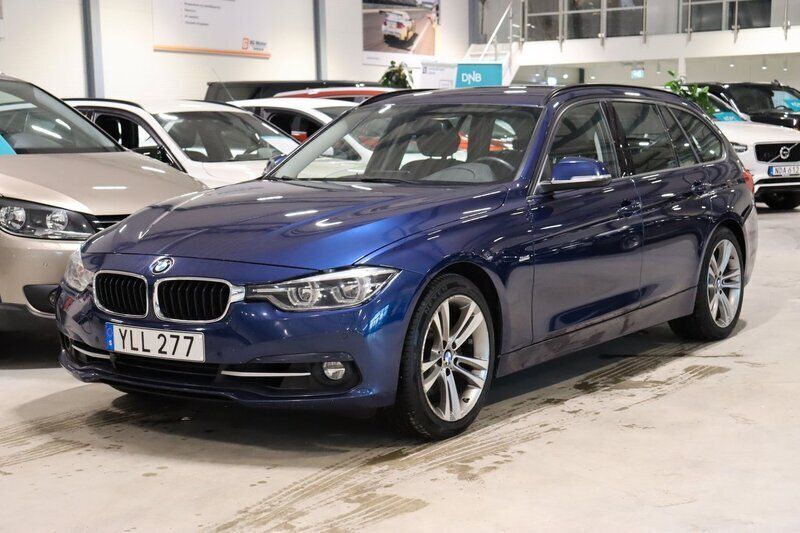 Blå Begagnad 2018 BMW 330 Sport Line Kombi | 234 900 kr (Marknadspris) - Bild 1/4