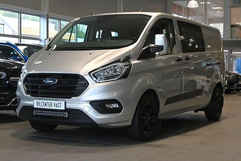 Grå (moondust silver metallic) Begagnad 2023 Ford Transit Custom Van | 459 000 kr - Bild 1/4