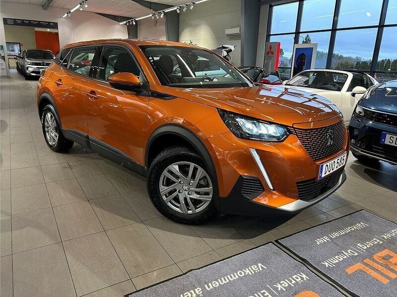 Orange Begagnad 2021 Peugeot e-2008 Active SUV | 194 900 kr (Marknadspris) - Bild 1/4