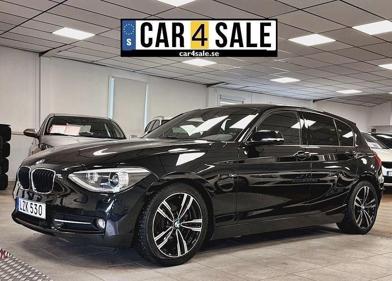 Svart Begagnad 2011 BMW 118 Sport Line Halvkombi | 99 900 kr (Dyr) - Bild 1/4