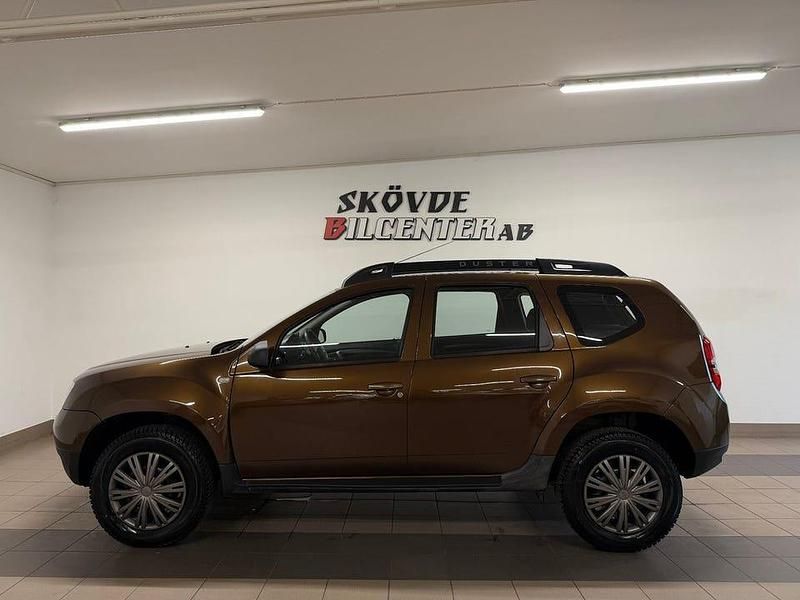 Brun Begagnad 2014 Dacia Duster Lauréate SUV | 64 500 kr (Marknadspris) - Bild 1/4