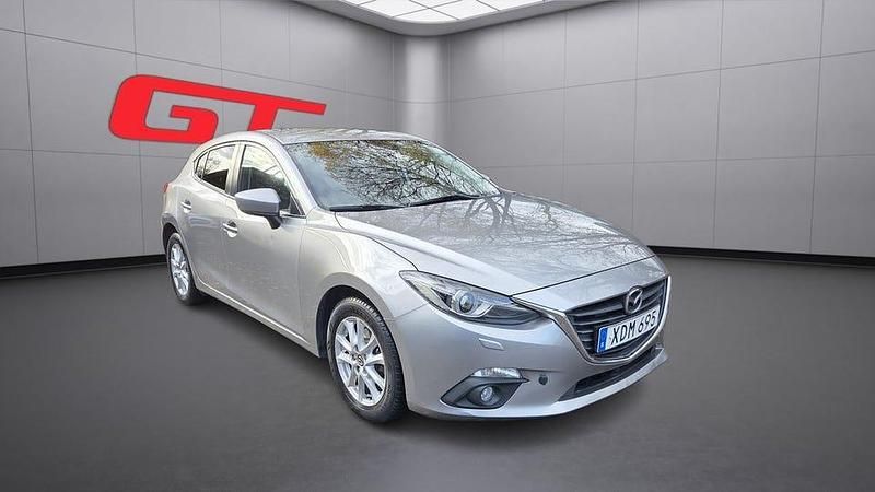 Grå Begagnad 2014 Mazda 3 Inclusive Halvkombi | 139 900 kr (Marknadspris) - Bild 1/4