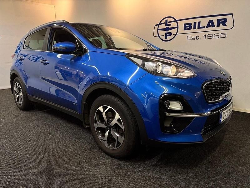 Blå Begagnad 2018 Kia Sportage Advance SUV | 209 000 kr (Marknadspris) - Bild 1/4