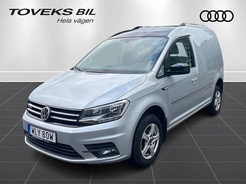 Flerfärgad (reflexsilver/svart tak) Begagnad 2020 VW Caddy Minibuss | 209 900 kr (Superpris) - Bild 1/4