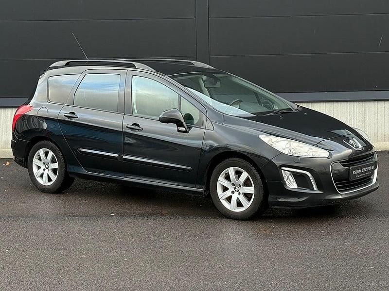 Begagnad Peugeot 308 SW 112 HK (82 kW) 2011 Svart Kombi