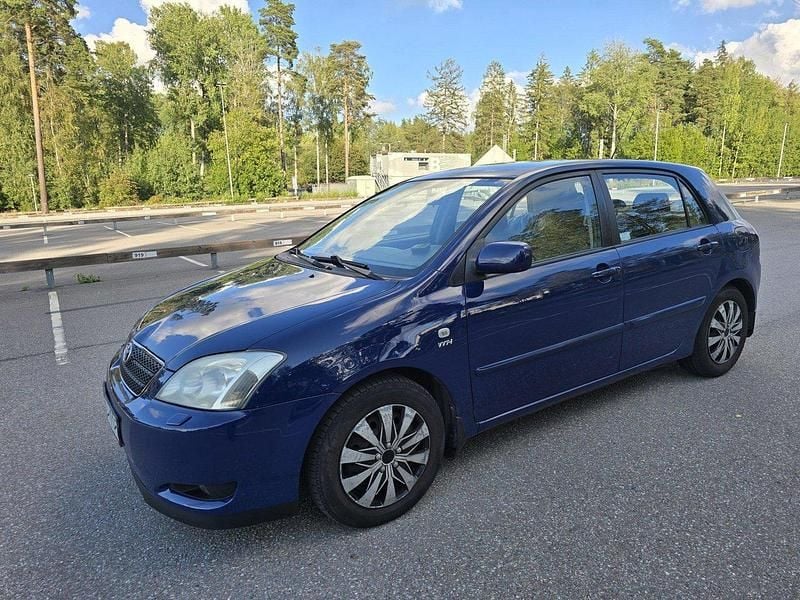 Blå Begagnad 2003 Toyota Corolla Halvkombi | 39 000 kr (Marknadspris) - Bild 1/4