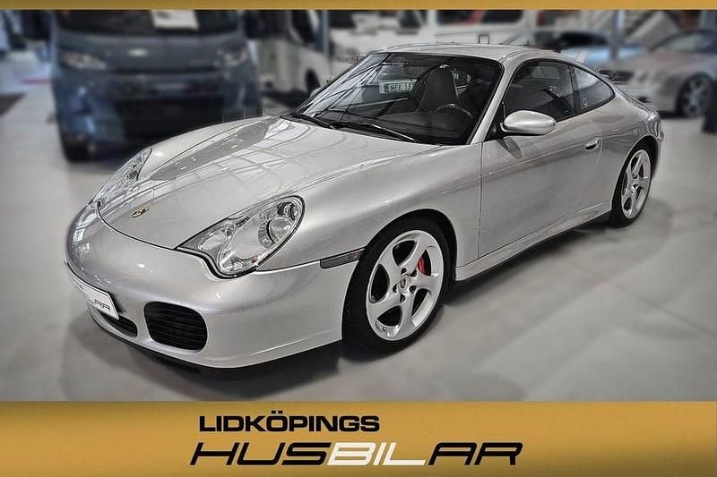 Silvermetallic Begagnad 2003 Porsche 911 Carrera 4S Sportkupé | 679 000 kr - Bild 1/4