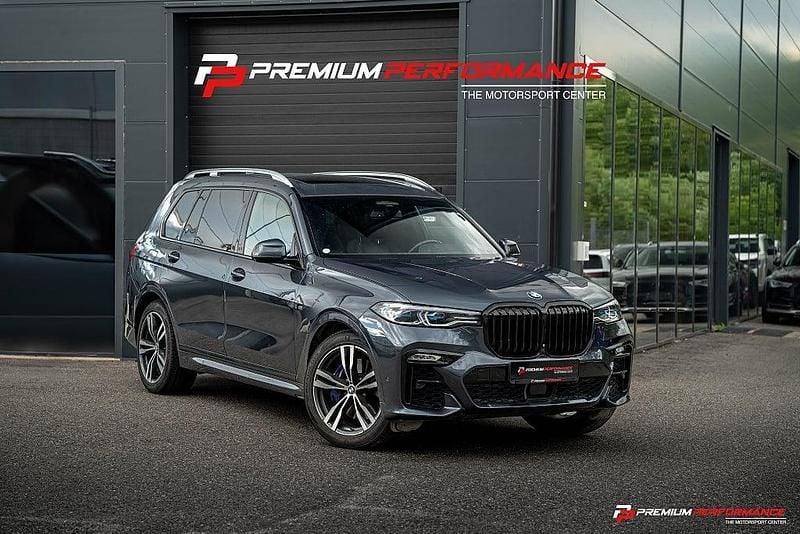 Mörkgrå Begagnad 2021 BMW X7 M Sport SUV | 699 800 kr (Marknadspris) - Bild 1/4