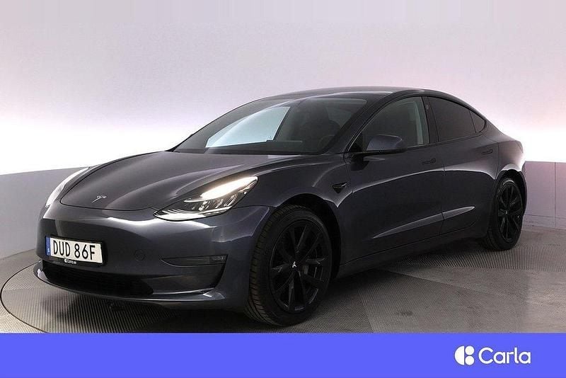 Grå Begagnad 2019 Tesla Model 3 Long Range Sedan | 252 900 kr (Marknadspris) - Bild 1/4