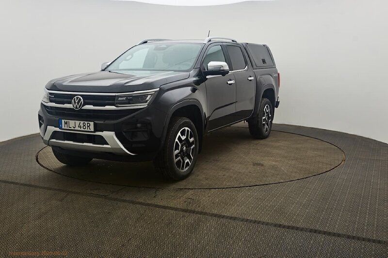 Svart Begagnad 2023 VW Amarok Style Pickup | 655 000 kr (Marknadspris) - Bild 1/4