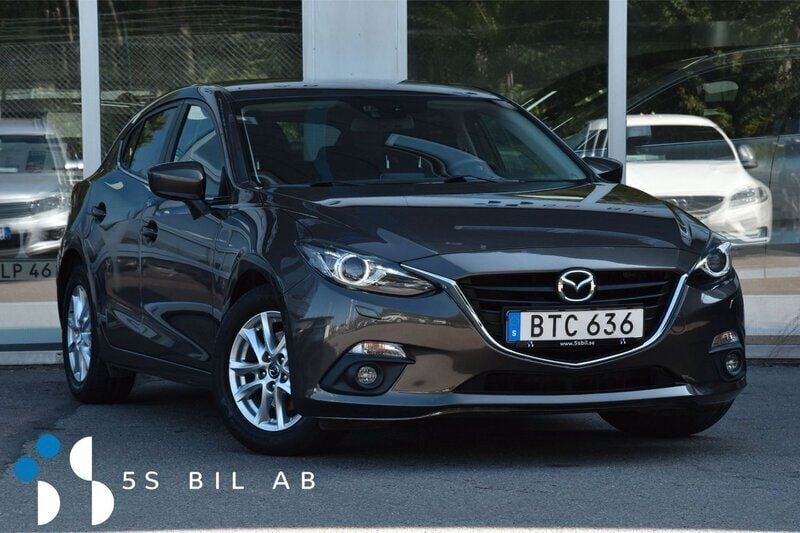 Brun Begagnad 2015 Mazda 3 Inclusive Halvkombi | 154 900 kr (Marknadspris) - Bild 1/4