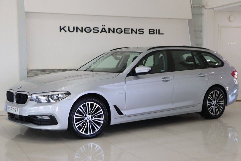 Silver Begagnad 2017 BMW 520 Sport Line Kombi | 239 900 kr (Lite dyr) - Bild 1/4