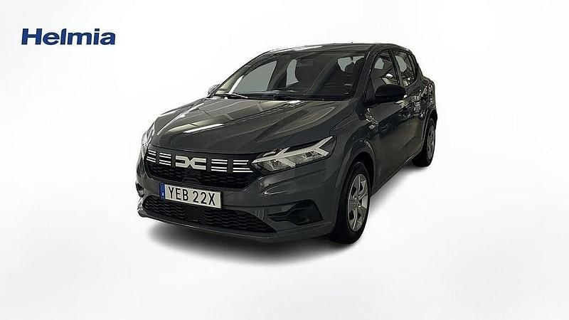 Grå Begagnad 2023 Dacia Sandero Essentiel Halvkombi | 129 000 kr (Marknadspris) - Bild 1/4