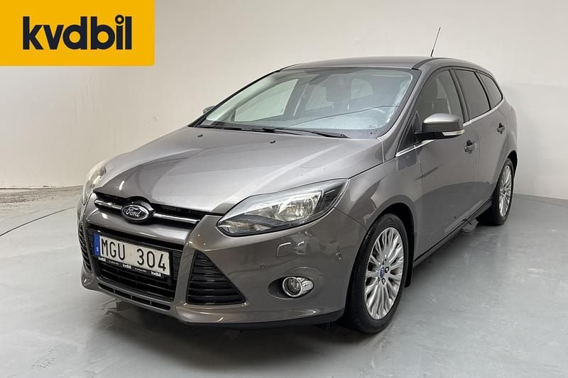Begagnad Ford Focus Titanium 125 HK (91 kW) 2013 Brun Kombi