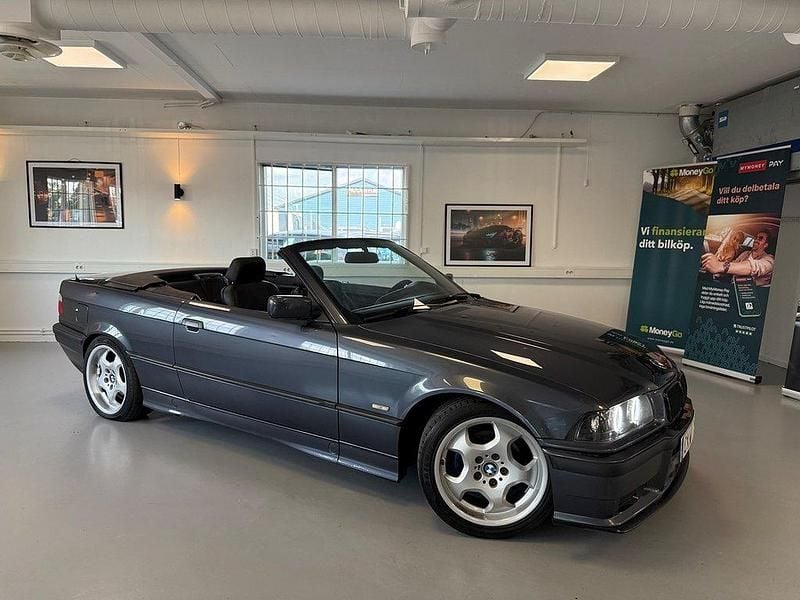 Mörkgrå Begagnad 1998 BMW 318 Cabriolet M Sport Cab | 59 900 kr - Bild 1/4