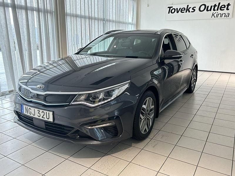 Grå Begagnad 2019 Kia Optima Hybrid 2 Sedan | 189 900 kr (Bra pris) - Bild 1/4