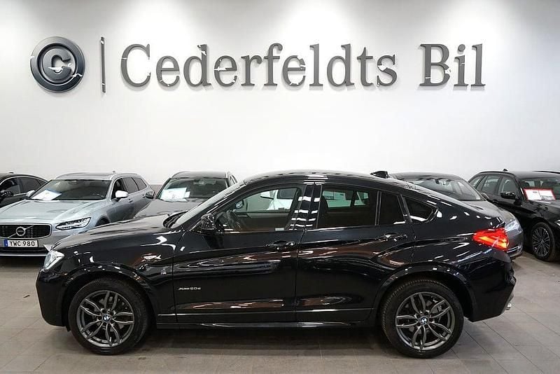 Svart Begagnad 2015 BMW X4 M Sport SUV | 214 900 kr (Marknadspris) - Bild 1/4