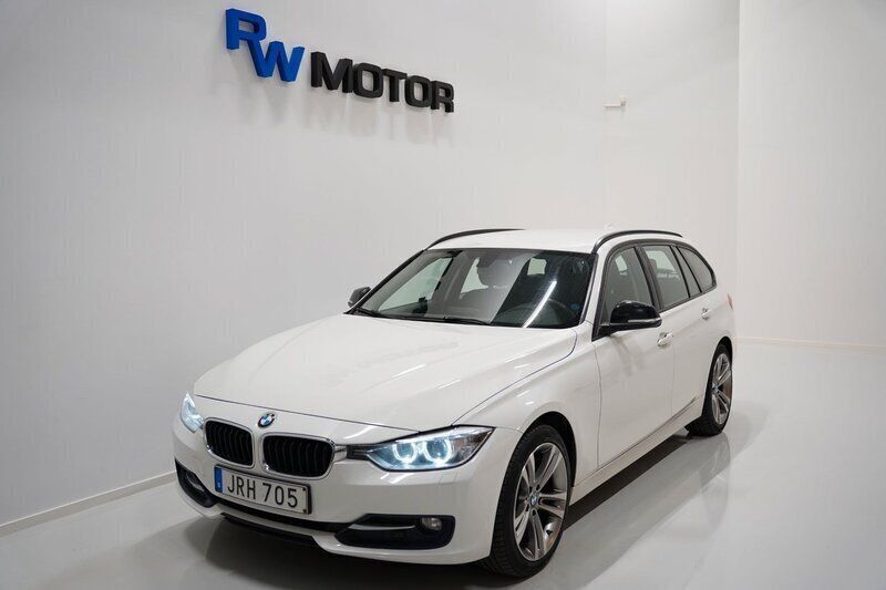 Vit Begagnad 2015 BMW 318 Sport Line Kombi | 129 800 kr (Marknadspris) - Bild 1/4