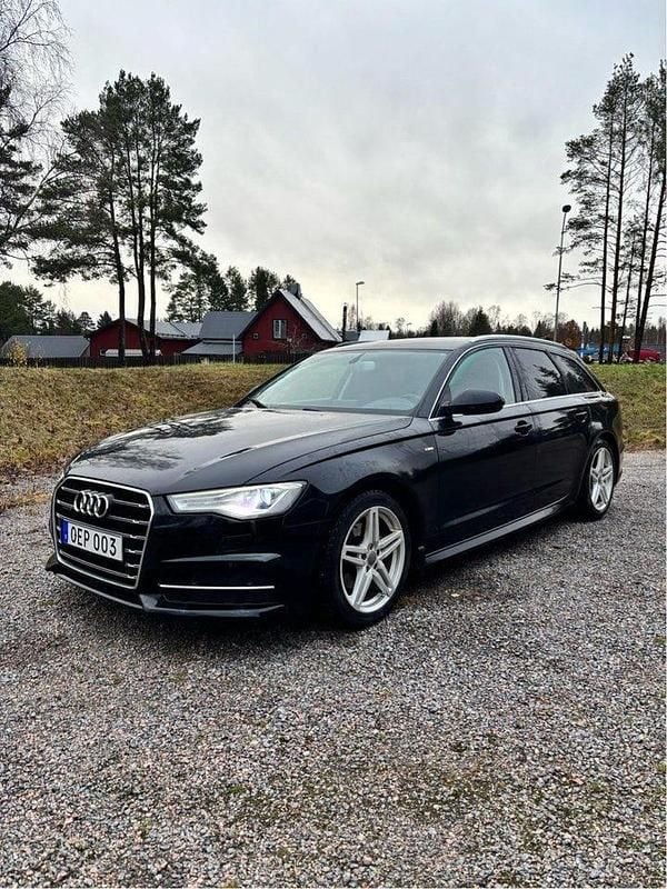 Svart Begagnad 2017 Audi A6 Ambition Kombi | 159 999 kr (Marknadspris) - Bild 1/4