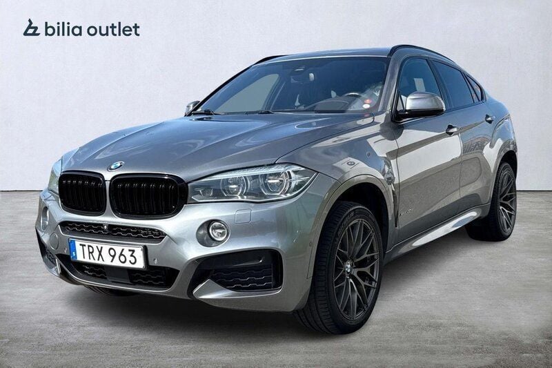 Grå Begagnad 2016 BMW X6 M Sport SUV | 369 900 kr (Marknadspris) - Bild 1/4