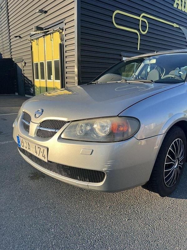 Silver Begagnad 2003 Nissan Almera Halvkombi | 27 000 kr (Marknadspris) - Bild 1/4