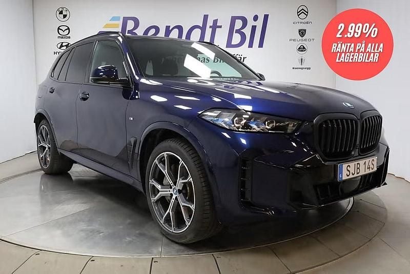Blå Begagnad 2024 BMW X5 M Sport SUV | 944 500 kr (Marknadspris) - Bild 1/4