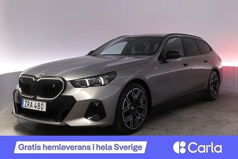 Grå Begagnad 2024 BMW i5 M Sport Kombi | 632 900 kr - Bild 1/4