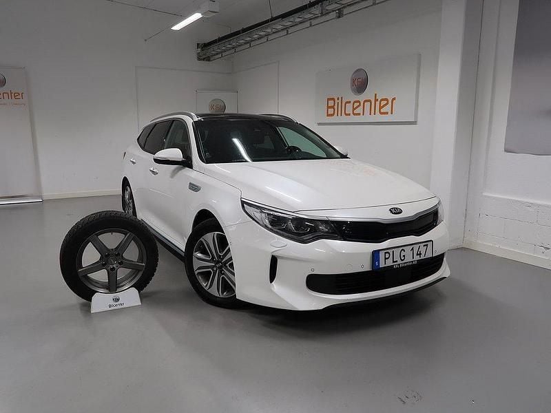 Vit Begagnad 2017 Kia Optima Hybrid Sedan | 169 900 kr (Marknadspris) - Bild 1/3