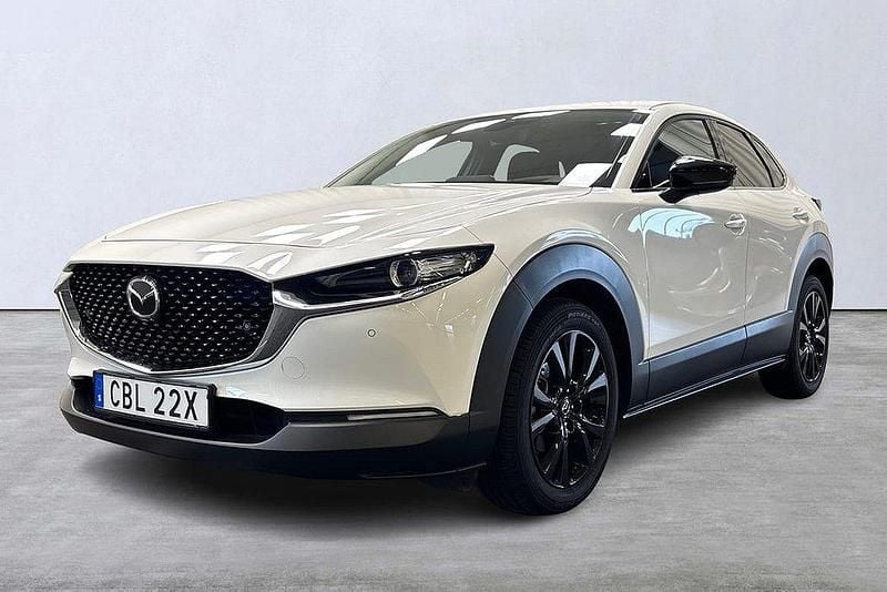 Vit Begagnad 2021 Mazda CX-30 SUV | 269 900 kr (Lite dyr) - Bild 1/4