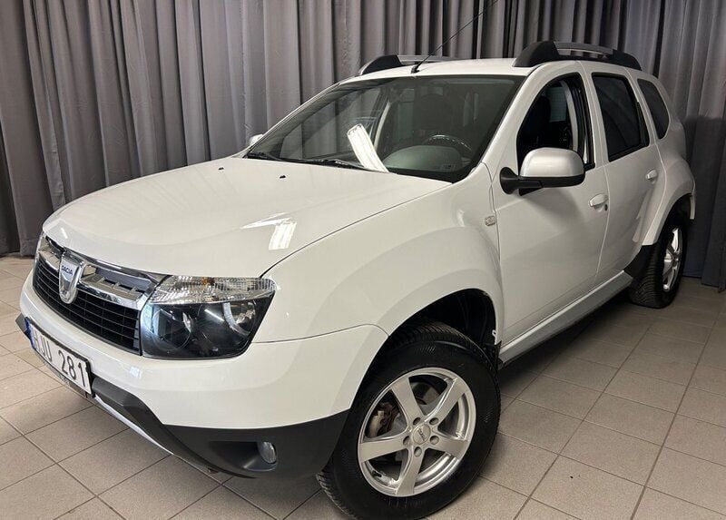 Vit Begagnad 2011 Dacia Duster SUV | 102 900 kr (Marknadspris) - Bild 1/4