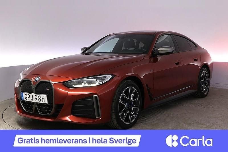 Orange Begagnad 2022 BMW i4 M Sport Sedan | 452 900 kr (Superpris) - Bild 1/4