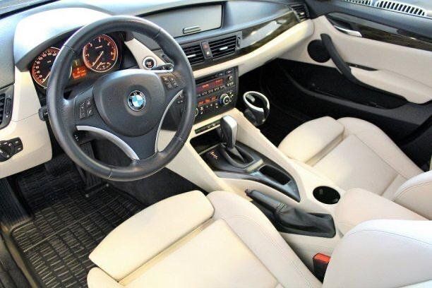 Svart Begagnad 2010 BMW X1 xLine SUV | 85 000 kr (Marknadspris) - Bild 1/4