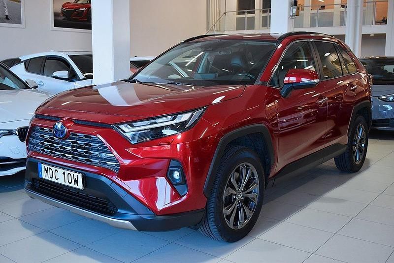 Röd Begagnad 2021 Toyota RAV4 Hybrid Executive SUV | 369 000 kr (Marknadspris) - Bild 1/4