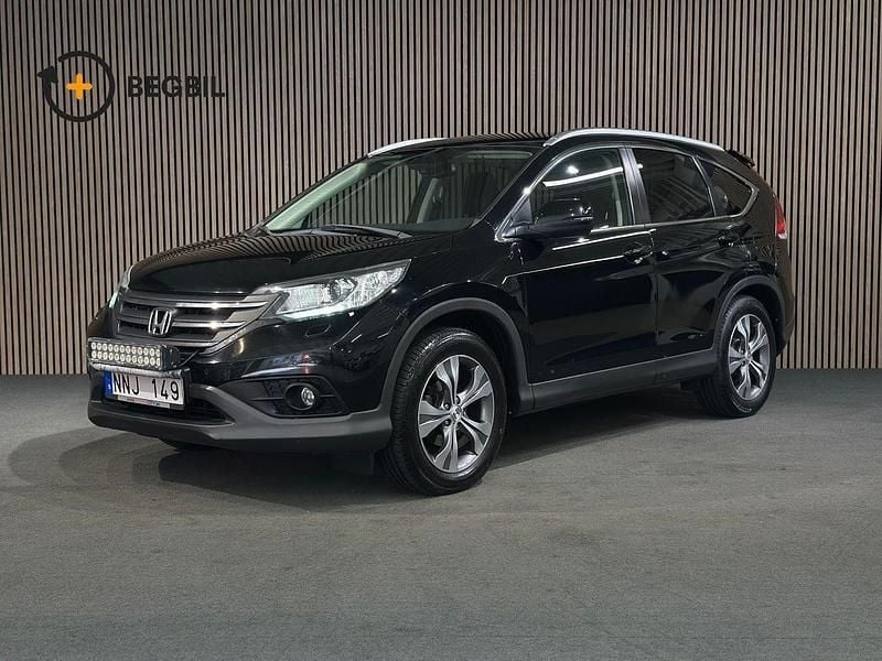 Svart Begagnad 2014 Honda CR-V S SUV | 132 400 kr (Marknadspris) - Bild 1/4