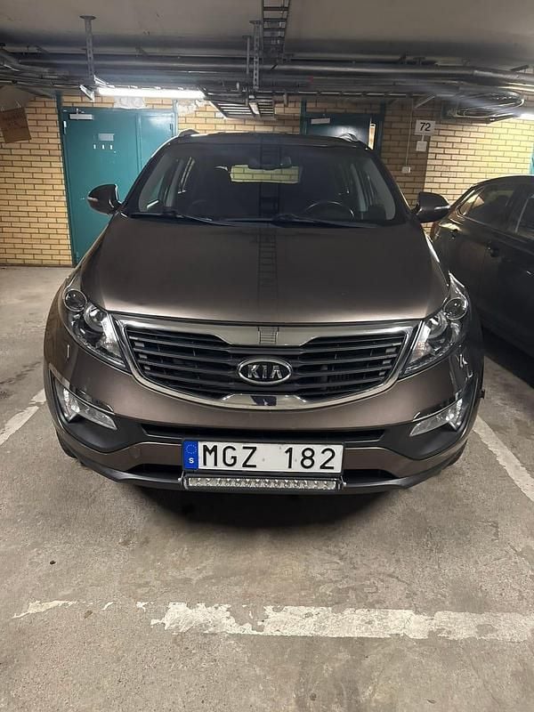 Brun Begagnad 2012 Kia Sportage SUV | 110 000 kr (Bra pris) - Bild 1/4