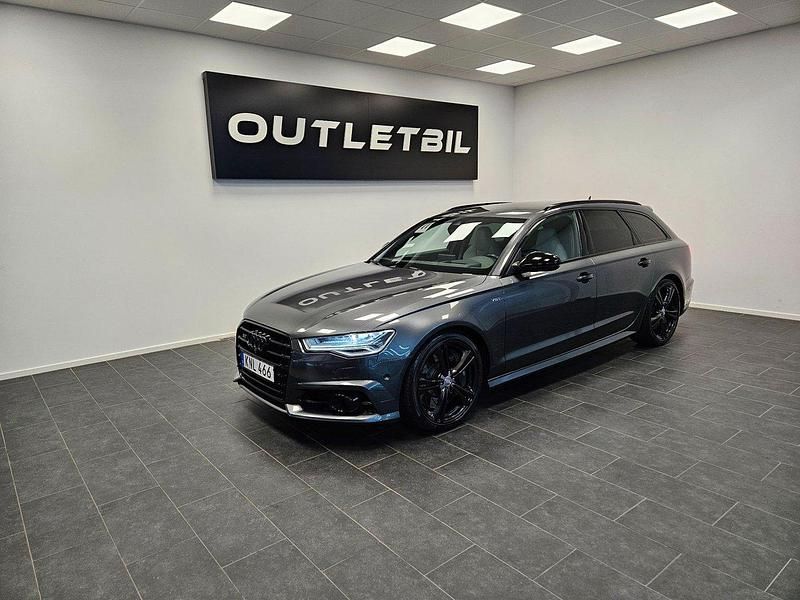 Grå Begagnad 2015 Audi RS6 Kombi | 369 000 kr - Bild 1/4