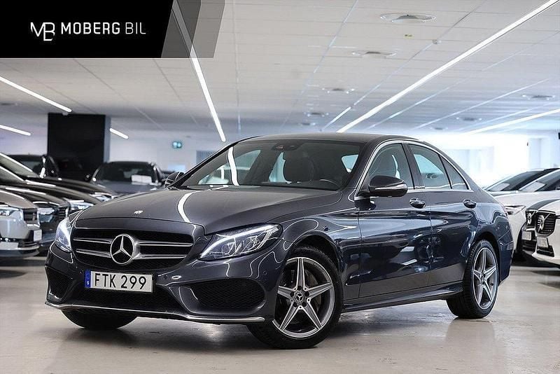 Mörkgrå Begagnad 2015 Mercedes C250 AMG line Sedan | 179 900 kr (Marknadspris) - Bild 1/3