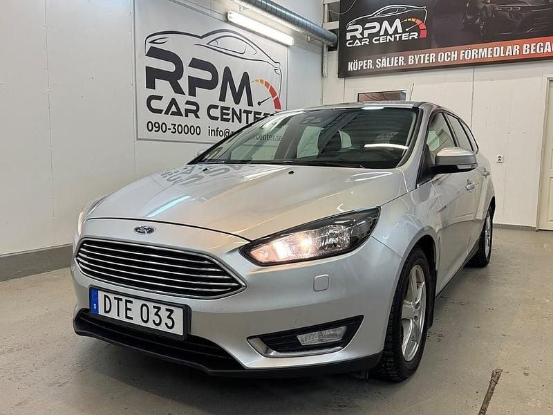 Grå Begagnad 2014 Ford Focus Titanium Kombi | 89 900 kr (Lite dyr) - Bild 1/4
