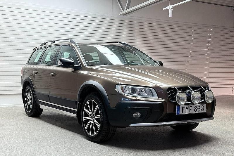 Brun (twilight bronze metallic) Begagnad 2014 Volvo XC70 Dynamic Kombi | 195 000 kr (Marknadspris) - Bild 1/4