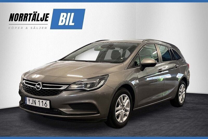 Grå Begagnad 2016 Opel Astra Enjoy Kombi | 99 900 kr (Marknadspris) - Bild 1/3