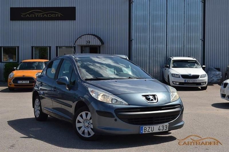 Mörkgrå (grå) Begagnad 2006 Peugeot 207 Halvkombi | 29 900 kr (Lite dyr) - Bild 1/4