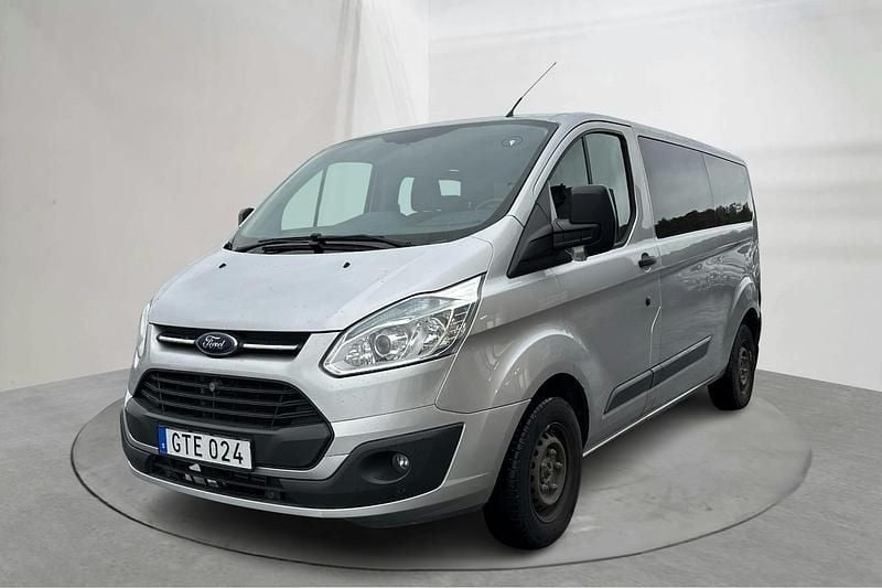 Grå Begagnad 2015 Ford Transit Custom Kombi | 139 000 kr (Marknadspris) - Bild 1/4