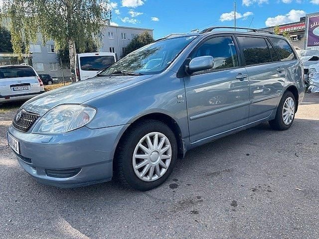 Ljusblå Begagnad 2002 Toyota Corolla Kombi | 29 000 kr (Marknadspris) - Bild 1/4
