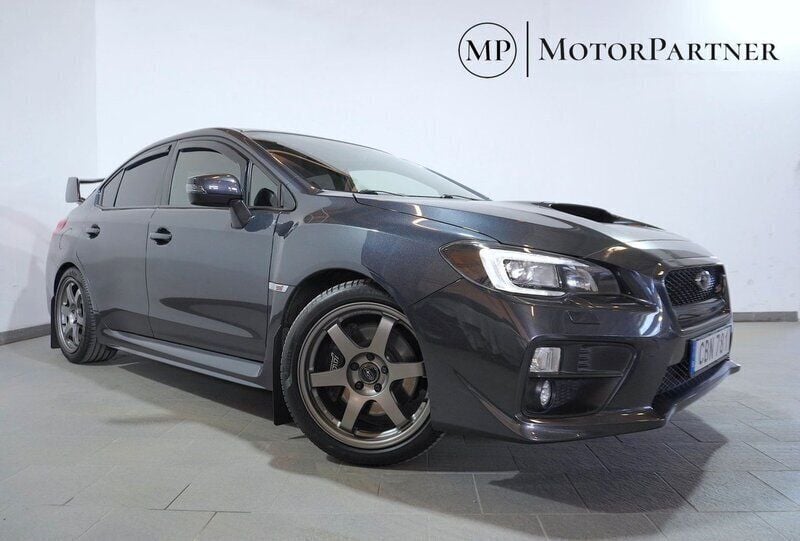 Mörkgrå Begagnad 2015 Subaru WRX STI Sedan | 329 900 kr - Bild 1/4