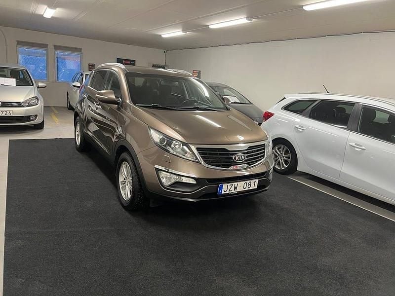 Ljusbrun Begagnad 2012 Kia Sportage EX SUV | 74 900 kr (Bra pris) - Bild 1/4