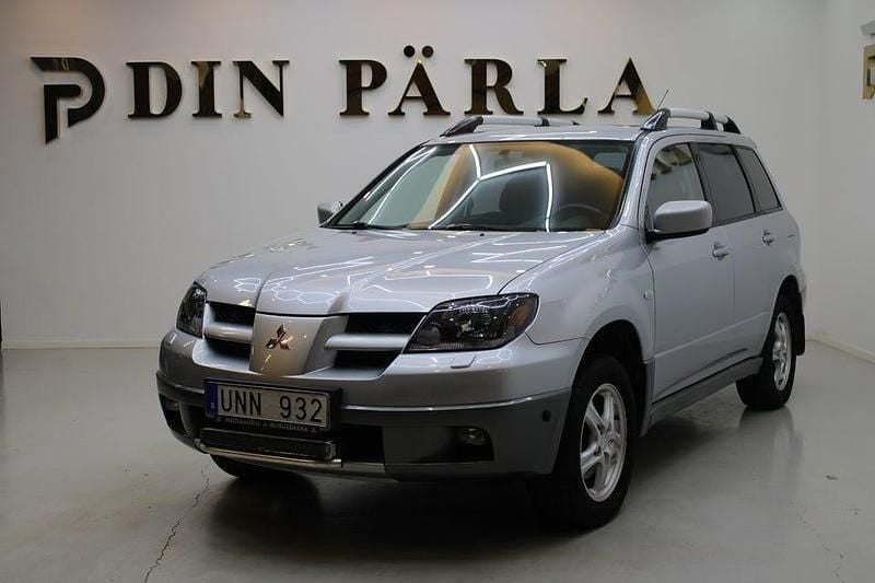 Silver Begagnad 2004 Mitsubishi Outlander SUV | 54 900 kr (Dyr) - Bild 1/4