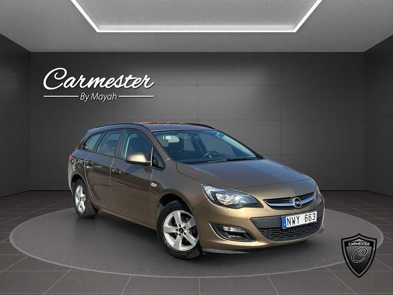 Brun Begagnad 2013 Opel Astra Enjoy Kombi | 59 990 kr (Dyr) - Bild 1/4